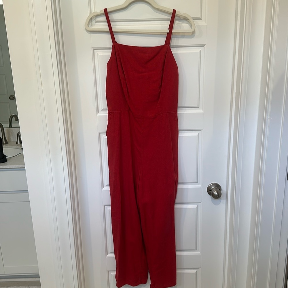 Women’s red linen jumpsuit.
